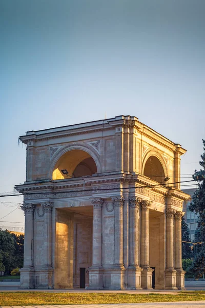 CHISINAU, MOLDOVA - august 20, 2022: Triumphal Arch sunset beautiful light monument national square Victory European Capital center city long exposure