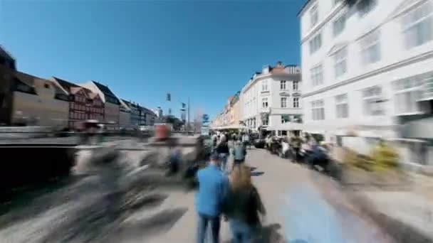Copenhagen, Denmark, Hyperlapse - First person POV of the Nyhavn waterfront canal and entertainment district during a sunny day — Wideo stockowe