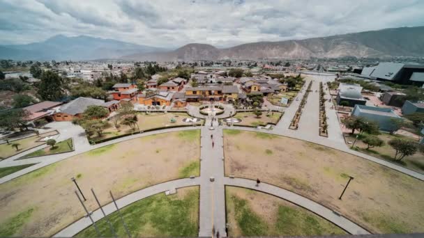 Quito, Ecuador, Timelapse - The Mitad del Mundo site in the Ecaudorian capital during a cloudy day as seen from the top of the monument – stockvideo