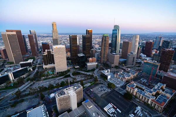 The downtown Los Angeles California and the city traffic at dusk. Picture taken from a helicopter after the sunset