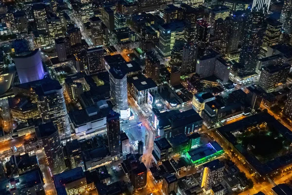 Aerial photograph of the iconic square of Toronto called Dundas Square as seen from a helicopter at night