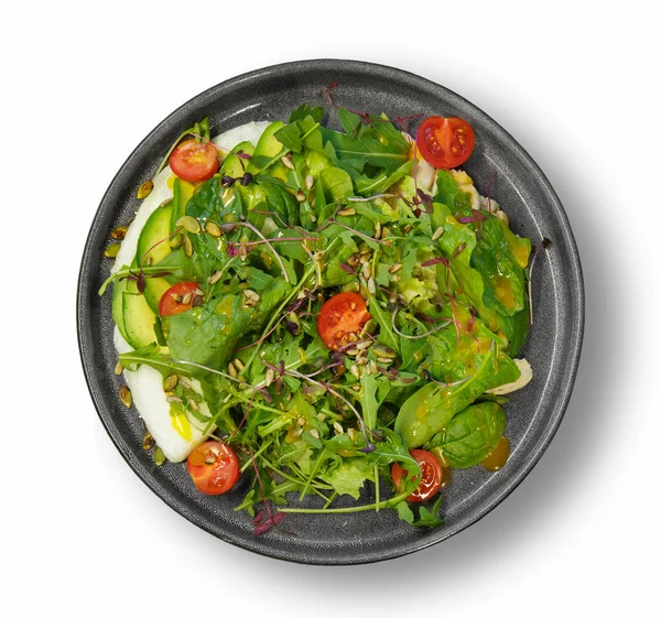Çırpılmış yumurta, domates ve avokado yeşili salata.. 