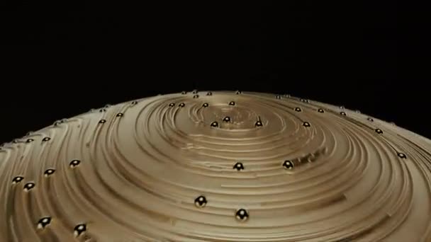 Flying over golden ball with circular topographic animated lines and particles on black background — Stock Video