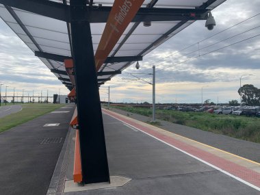 Metro trains stop at the railway platform in Adelaide. High quality photo