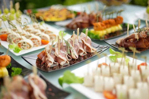 The classic Spanish hamon. Food delivery service and catering meals on the table during the event. — Stock Photo, Image