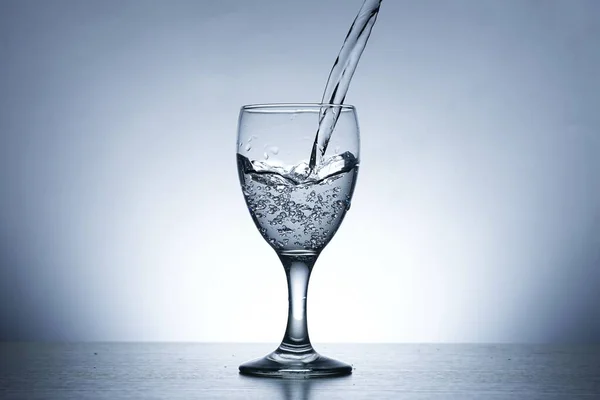 Photo Pouring Water Sour Glass — Foto de Stock
