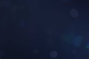 Arkaplanı dekore etmek için kullanılan koyu mavi arkaplan bokeh resmi.