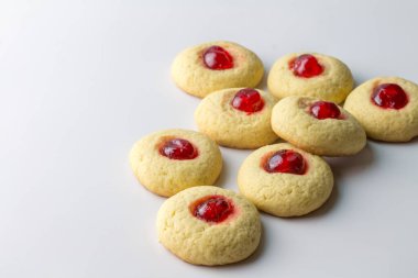 cherry thumb cookies isolated on white - homemade biscuits