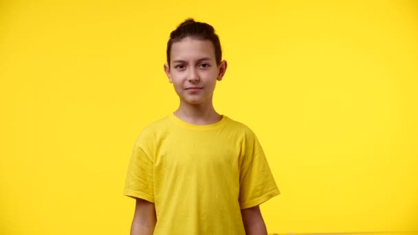 stop! I do not want to! it is forbidden! an angry boy shows that this is not allowed, he is long-haired, with a ponytail, dressed in a yellow T-shirt, the background is yellow