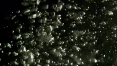 Köpüklü su baloncuklarıyla soyut arkaplan.