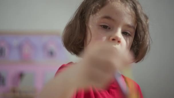 Close-up of a child girl drawing. — Stock Video