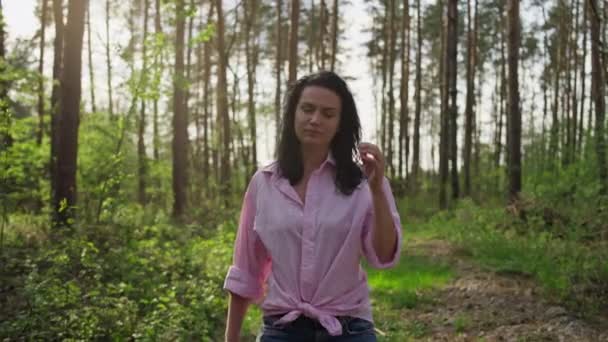 Beautiful Caucasian Woman Walks Park Alone Nature Slow Motion Video — Stock Video