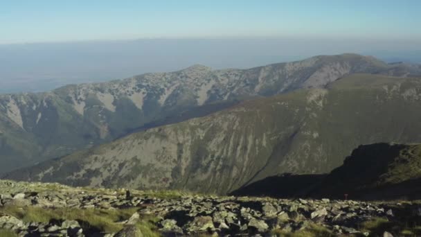Drone Flying Textured Mountain Ranges Haze Rocks Cliffs Beautiful Landscape — Stockvideo