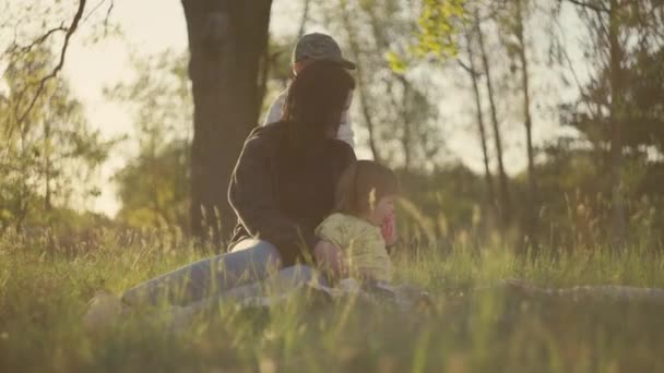 Family Sunset Park Spending Time Together Mom Playing Children Boy — Stock Video