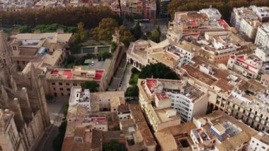 Urban landscape architecture of the old European city dron 4K video. Aerial view of streets, squares and parks with houses, cathedrals and roofs. High quality 4k footage