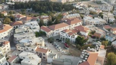 Drone video of a city on an island in the Mediterranean Sea its historic central part with old houses and streets. Aerial view Paphos Cyprus. High quality 4k footage