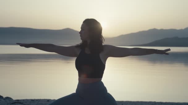 Morning Yoga Ocean Sunrise Girl Meditating Alone Holding Balance Active — Stock Video