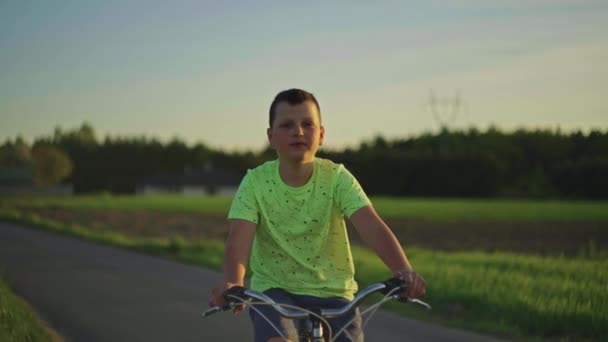 Caucasian Teenage Boy Rides Bicycle Park Child Engaged Active Lifestyle — Stockvideo