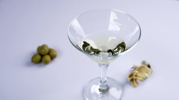 Beautiful Slow Motion Glass Vermouth Which Olive Added Martini Glass — 图库视频影像