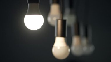 Turn on the light in the room. Eco bulb lamp lights up in a beautiful interior. Preservation of ecology and electricity in houses. Slow motion 4K video. High quality 4k footage