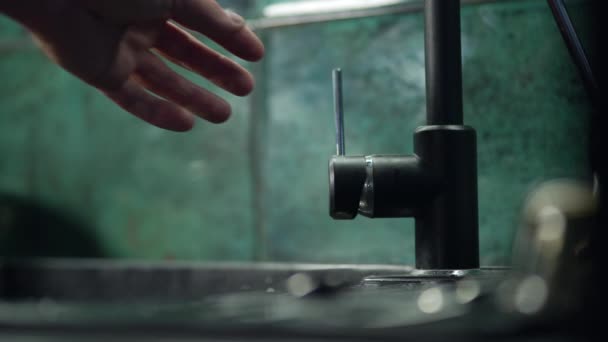 Turning Kitchen Faucet Mans Hand Homework Dishwashing Water Falls Tap — Wideo stockowe