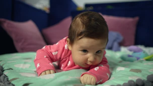 Large Portrait Newborn Girl Lies Her Tummy Smiles Beautiful Newborn — Stockvideo