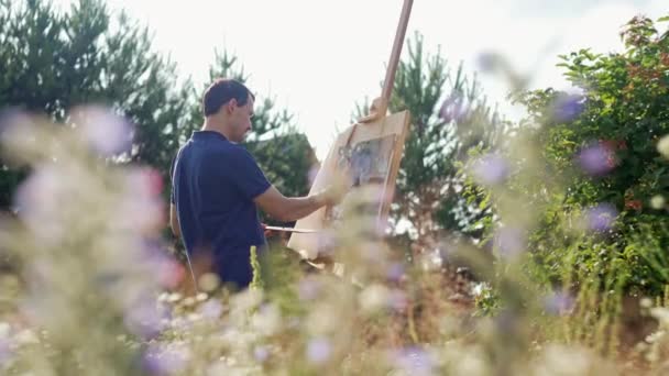 Artists Hand Paints Picture Lawn Flowers Man Artist Inspiration Nature — 비디오