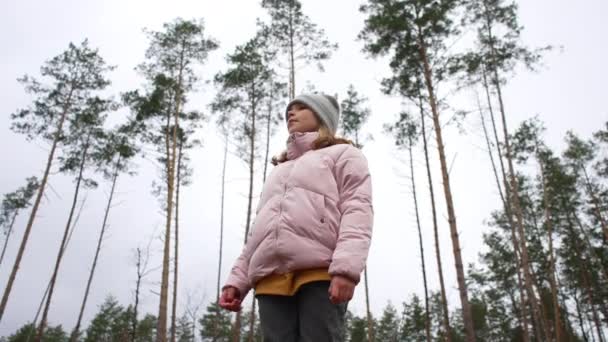 Girl Wearing Jeans Jacket Hat Spinning Woods Mystical Forest Pine — 图库视频影像