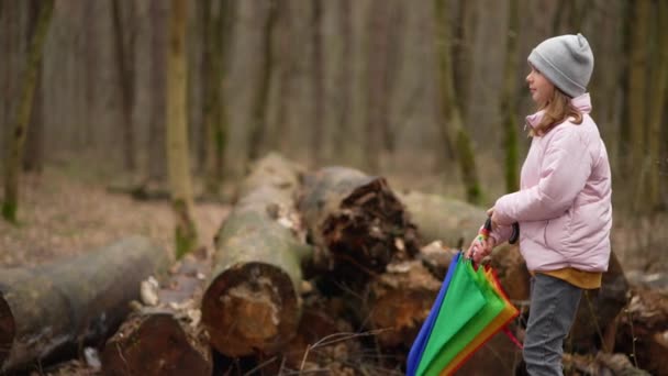 Child Opens Colorful Umbrella Rain Girl Walks Park Trees Rainy — Video Stock