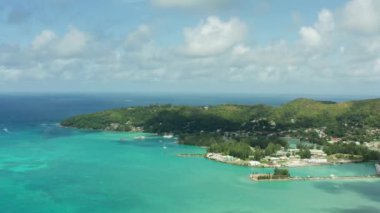 Aerial view nature of Seychelles. An exotic island on the shores of the Indian Ocean with beaches and a landscape of jungles and mountains. High quality 4k footage