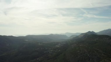 Aerial view Landscape of the mountains of Croatia. Greek peaks and ridges, cliff cliffs and forests in a beautiful tourist spot. High quality 4k footage