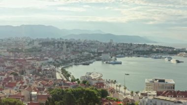 Aerial view Split Croatia. The historical center of the city, the embankment with boats, the port in the mountainous landscape on the seashore. High quality 4k footage