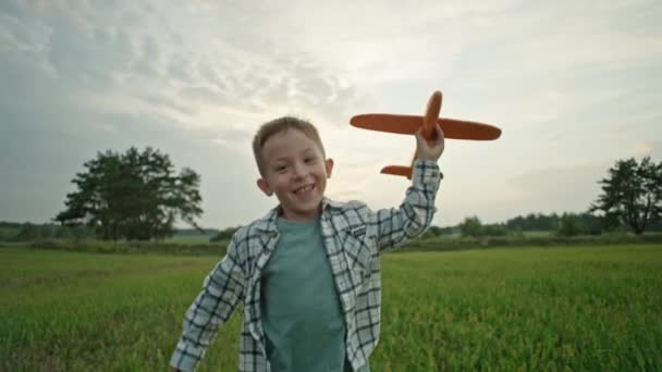 Close Boy Who Runs Airplane His Hands Wants Become Pilot — Stockvideo