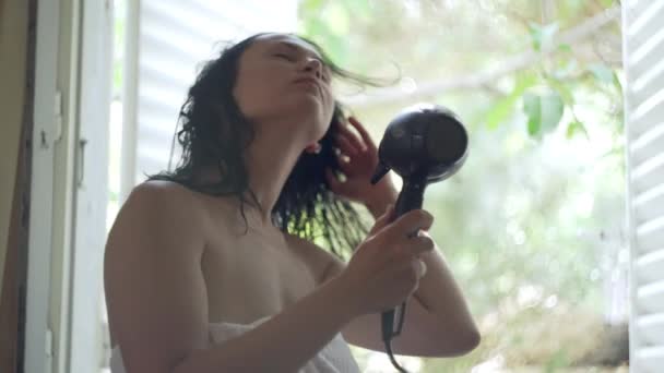 Caucasian Woman Drying Her Hair Window Girl Towel Uses Hair — Videoclip de stoc