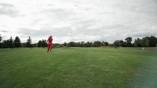 Cheerful Teenage Girl Doing Cartwheel Grass Park Beautiful Athletic Sports — Stock Video