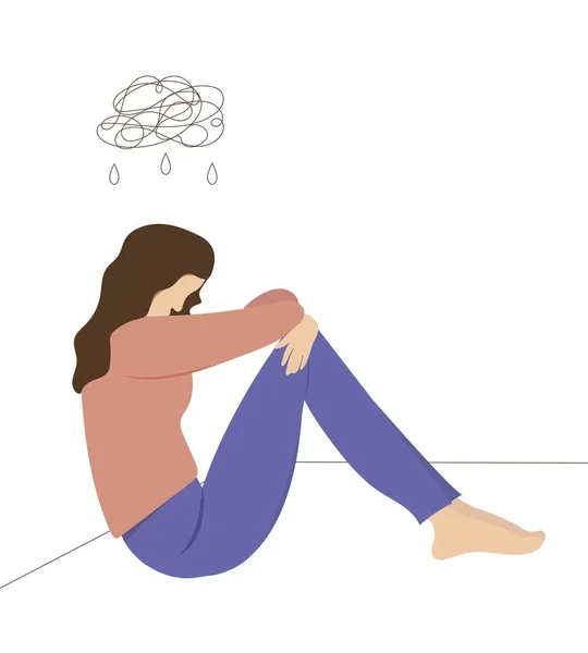 Ruhsal sorunları olan bir kız, endişe, depresyon. Kız yerde oturuyor.
