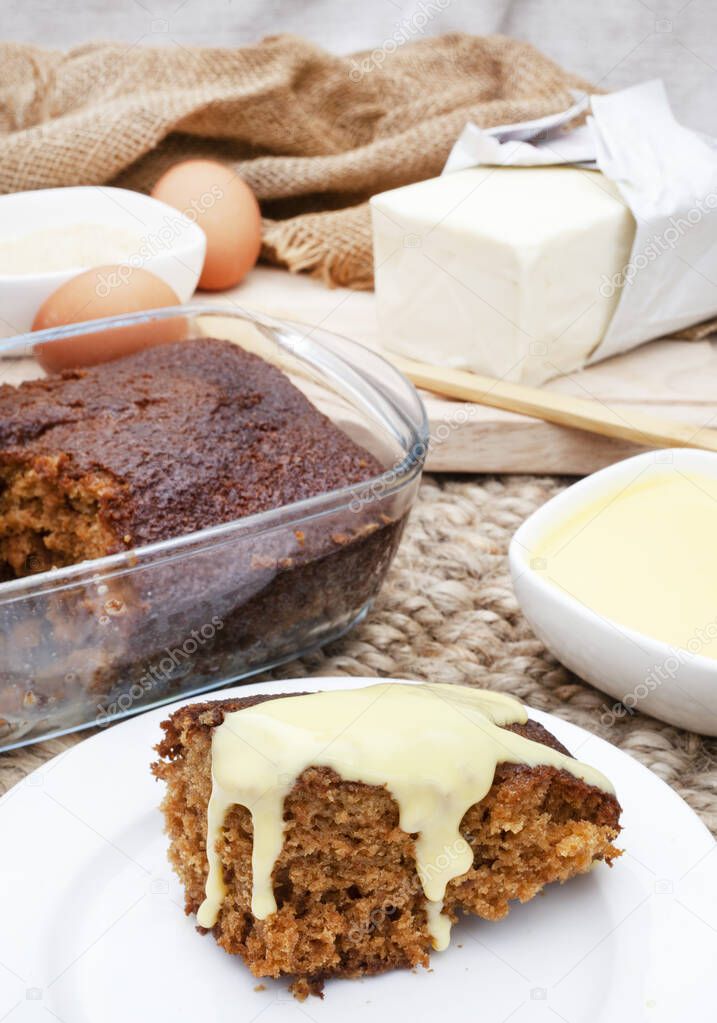 Traditional South African warm dessert or malva pudding in rustic setting