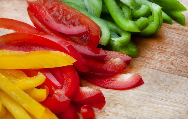 Fresh Three Colored Bell Peppers Julienne Cut Wooden Surface — Stock Photo, Image