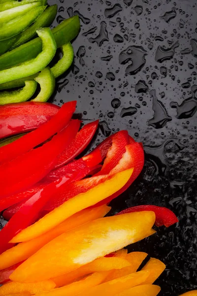 Fresh Three Colored Bell Peppers Julienne Cut Black Surface — Stock Photo, Image