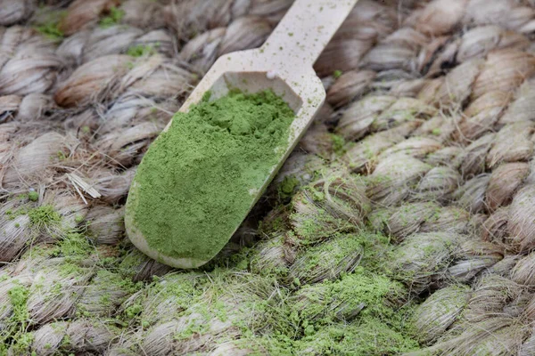 Close Green Matcha Tea Powder Rustic Woven Surface — Zdjęcie stockowe