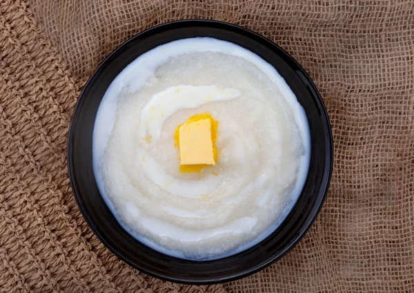 Traditional South African Maize meal porridge on rustic background