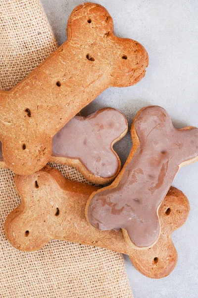 dog treats on neutral rustic background with copy space