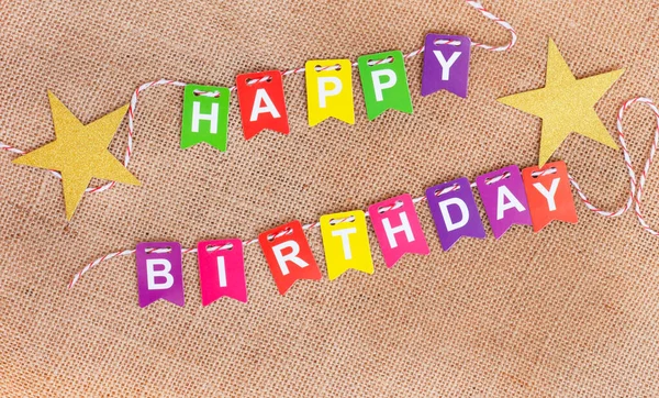 Colorful Happy Birthday Flags Neutral Rustic Hessian Surface Copy Space — Stock Photo, Image