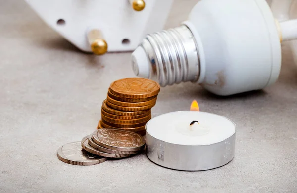 electricity and rising costs, light bulb and South African currency