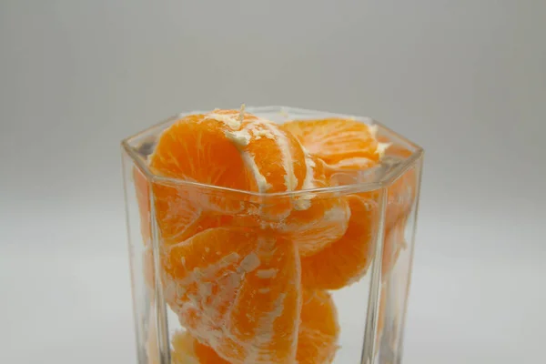 Peeled Tangerine Slices Glass Water — Fotografia de Stock