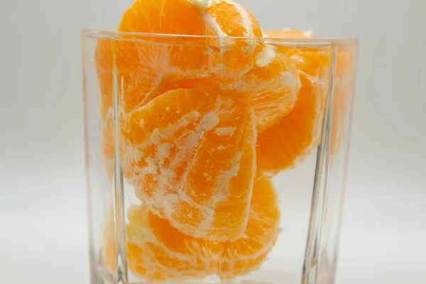 Peeled Tangerine Slices Glass Water — Stockfoto