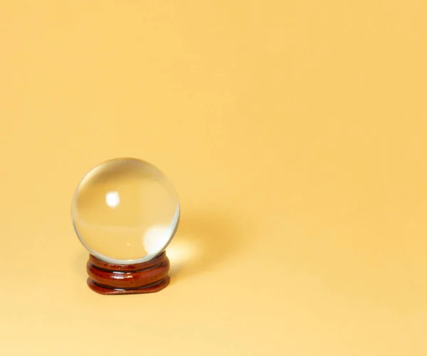 Crystal Ball Yellow Background — Stock Photo, Image