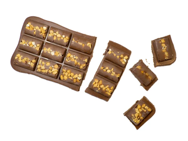 Mléčná Čokoláda Tyčinka Ořechy Bílém Pozadí Čokoládový Dezert Čokoládový Klín — Stock fotografie