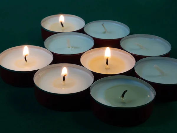 Short Candles Burning Dark Background Lots Small Candles All Candles — Stock Photo, Image