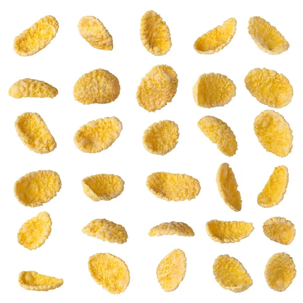 Sbírka padajících sladkých kukuřičných vloček izolovaných na bílém — Stock fotografie